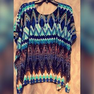 Blue, grey and black shirt. Size L